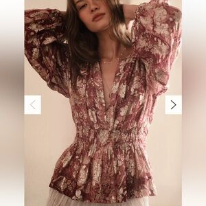 Anthropologie cinch waist blouse size medium.